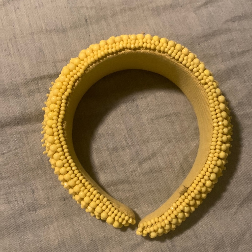 Beautiful yellow head band from Anthropologie. Worn once